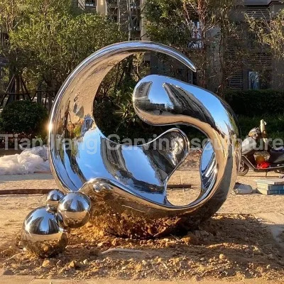 02872d13-f6cb-4089-bee6-c482ebb66f2f.webp Stainless steel mirror abstract water drop/circle sculpture
