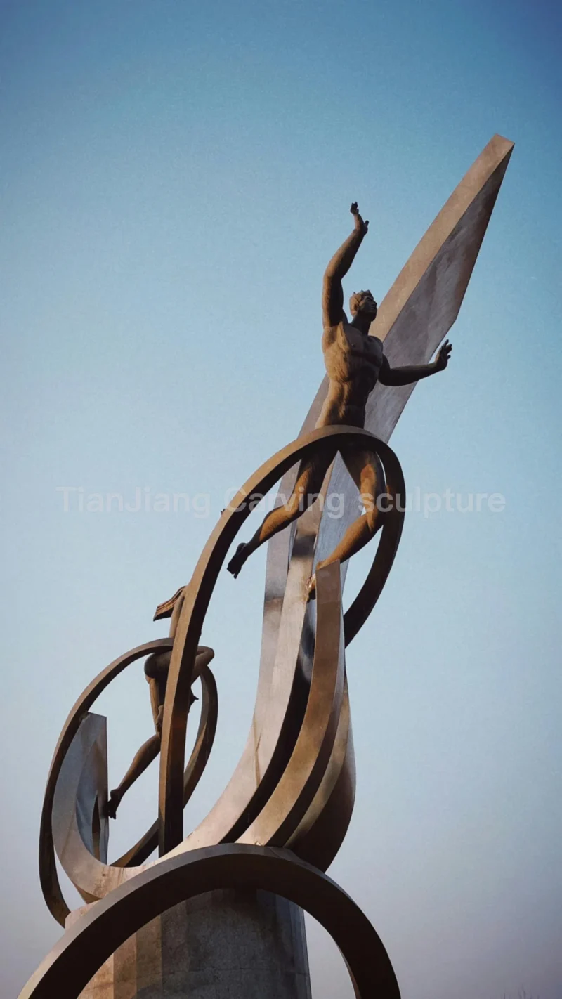 17134aa3-b1d0-4881-8a3b-cef464aca391.webp Stainless steel sports figure themed sculpture