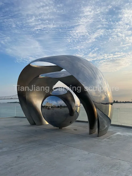 1abde20f-e53e-41be-8d63-a8f065e410d4.webp Stainless steel mirror abstract ring sphere sculpture