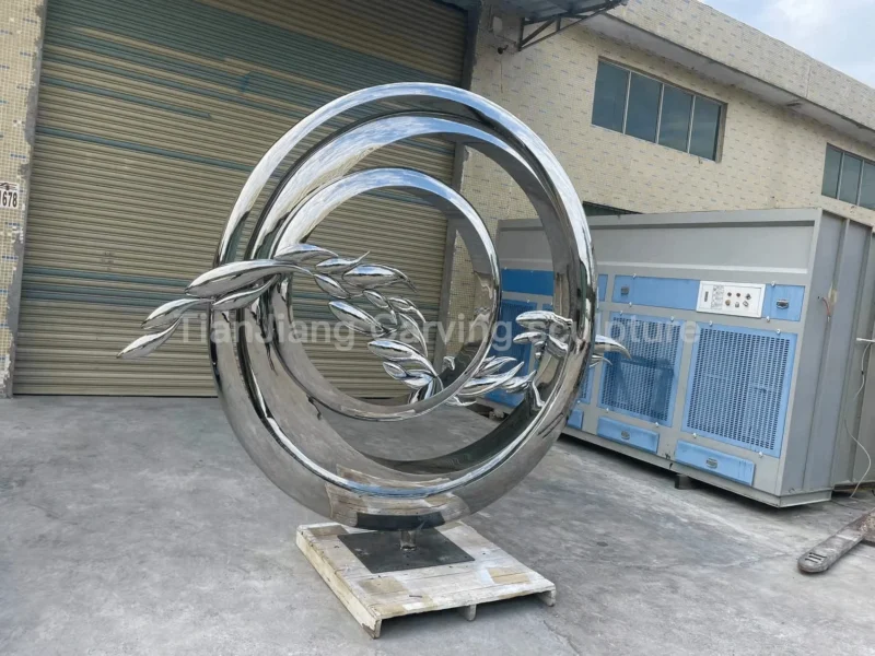 248223ba-a79b-4cb1-81b8-739b192e9578.webp Stainless steel mirror ring fish sculpture