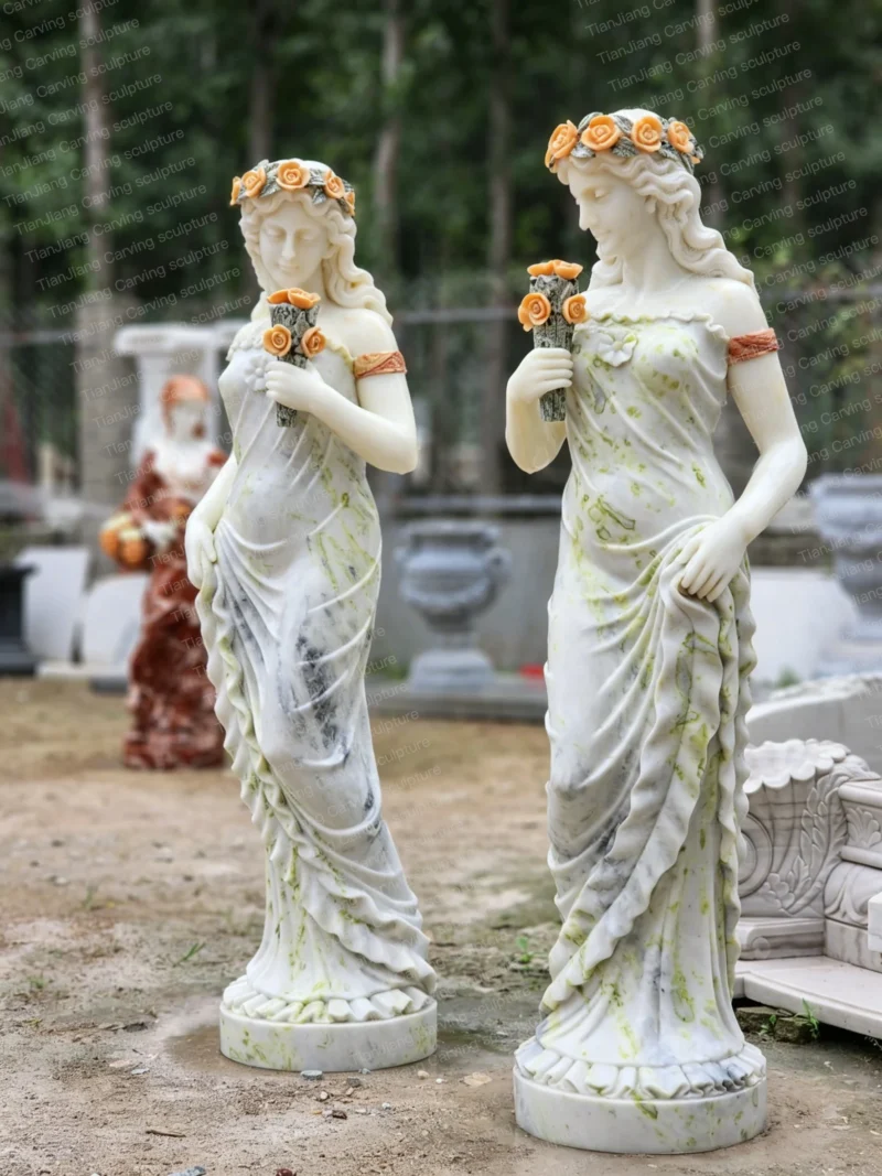 2564f14f-7f01-4726-8e97-4f754f9c262b.webp Marble European-style sculpture of a girl holding flowers (pair)