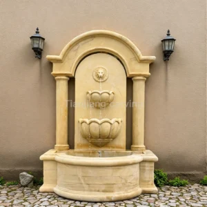Beige stone European style simple lion head wall fountain