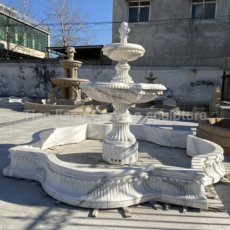 27f9461a-38e3-46c5-8bed-20544c59cb86.webp White marble double-layer European-style stone sculpture fountain