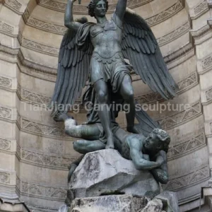Cast bronze archangel Michael slaying demon sculpture