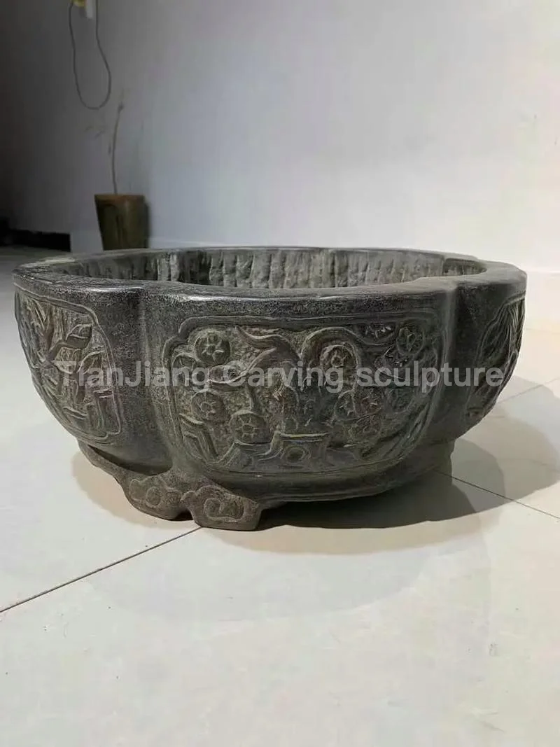2dde8ac5-ddde-4352-87e6-3bad33fd7e38.webp Bluestone antique carved crabapple-shaped stone basin