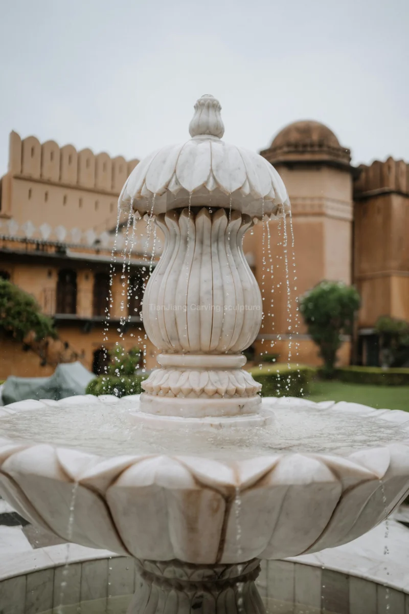 2f66a9f2-6f79-4c91-b993-e0656c967deb.webp White marble lotus shaped fountain sculpture