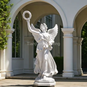 White marble stone sculpture of goddess of victory holding high laurel wreath