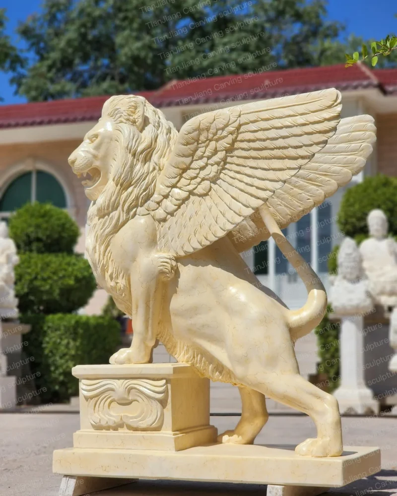 Beige stone flying lion (winged stone lion) sculpture