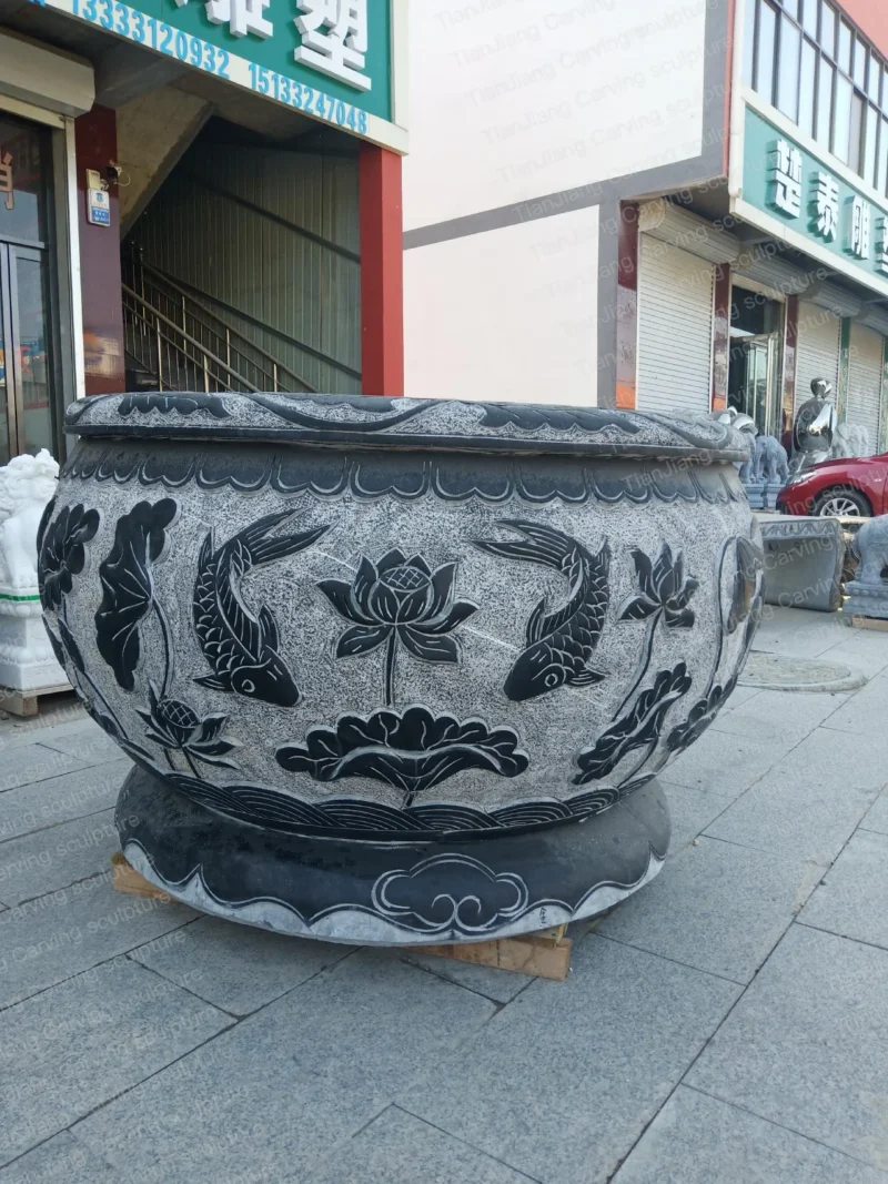 362b9a3f-f6f1-41c4-909f-a4d568800d2a.webp Bluestone antique lotus fish stone carving fish tank