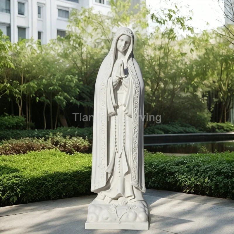 Marble statue of Our Lady of Fatima with the Rosary