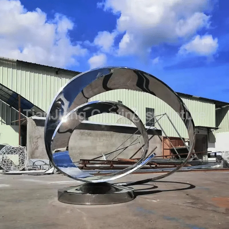 46e83fd6-fd93-48c5-91b7-05a9d7864099.webp Stainless steel mirror double ring intertwined sculpture