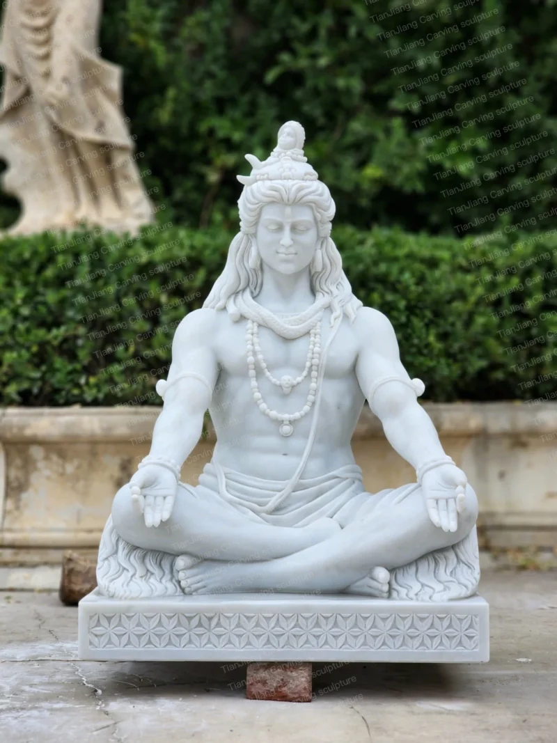 475e1017-ab17-41db-a730-77ee13ca9ad4.webp White marble Shiva statue sculpture