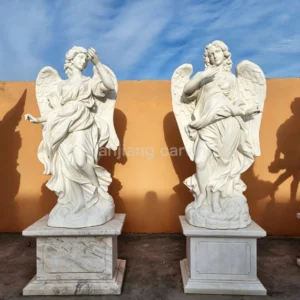 White marble European-style stone carvings of angel figures holding spears (pair)