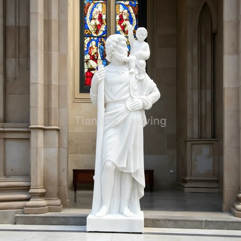 6299038e-364b-497f-9a21-c562ed411daa.webp Marble statue of Saint Joseph holding the Child
