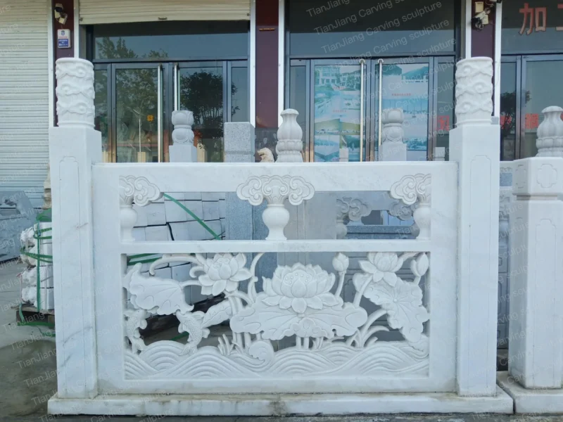 6825b8d0-ef38-4736-bba2-a13187bf1b97.webp White marble lotus fish relief stone railing (balustrade)