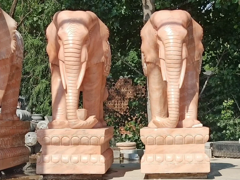 85f34bb6-e26f-4e14-b42c-3a58848efe5d.webp Sunset red stone elephants (pair)