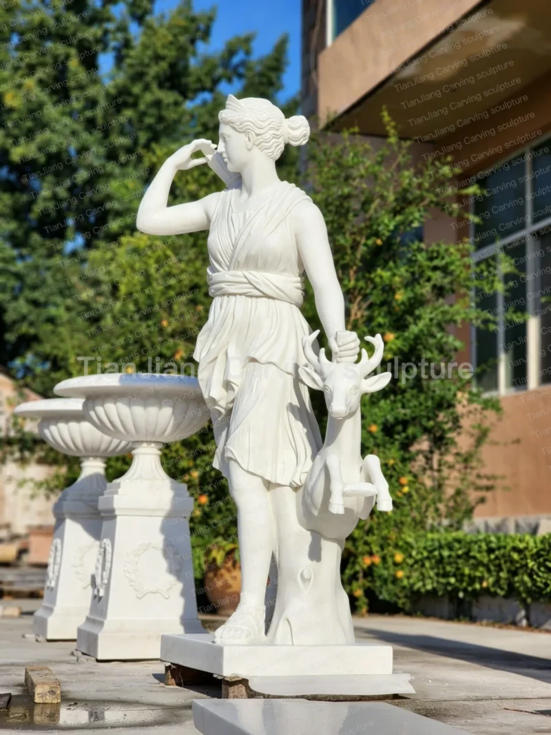 88207acf-898a-4bba-ab7e-ceda1e3a3c37.webp White marble sculpture of Artemis (Diana), goddess of the hunt