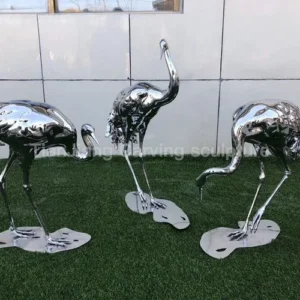Stainless steel mirror crane sculpture