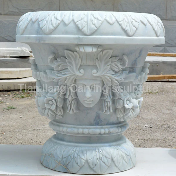 98670ab3-f294-4886-a66f-877001491a4a.webp White marble European style human face relief stone flower bowl