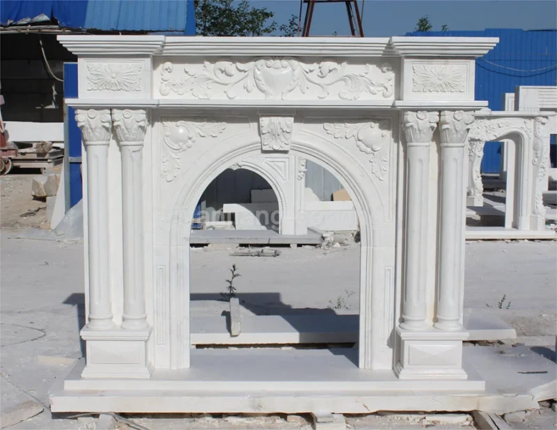 99a7a8fe-cd2b-4acc-8ef4-17d40ff59eda.webp White marble European style carved mantel