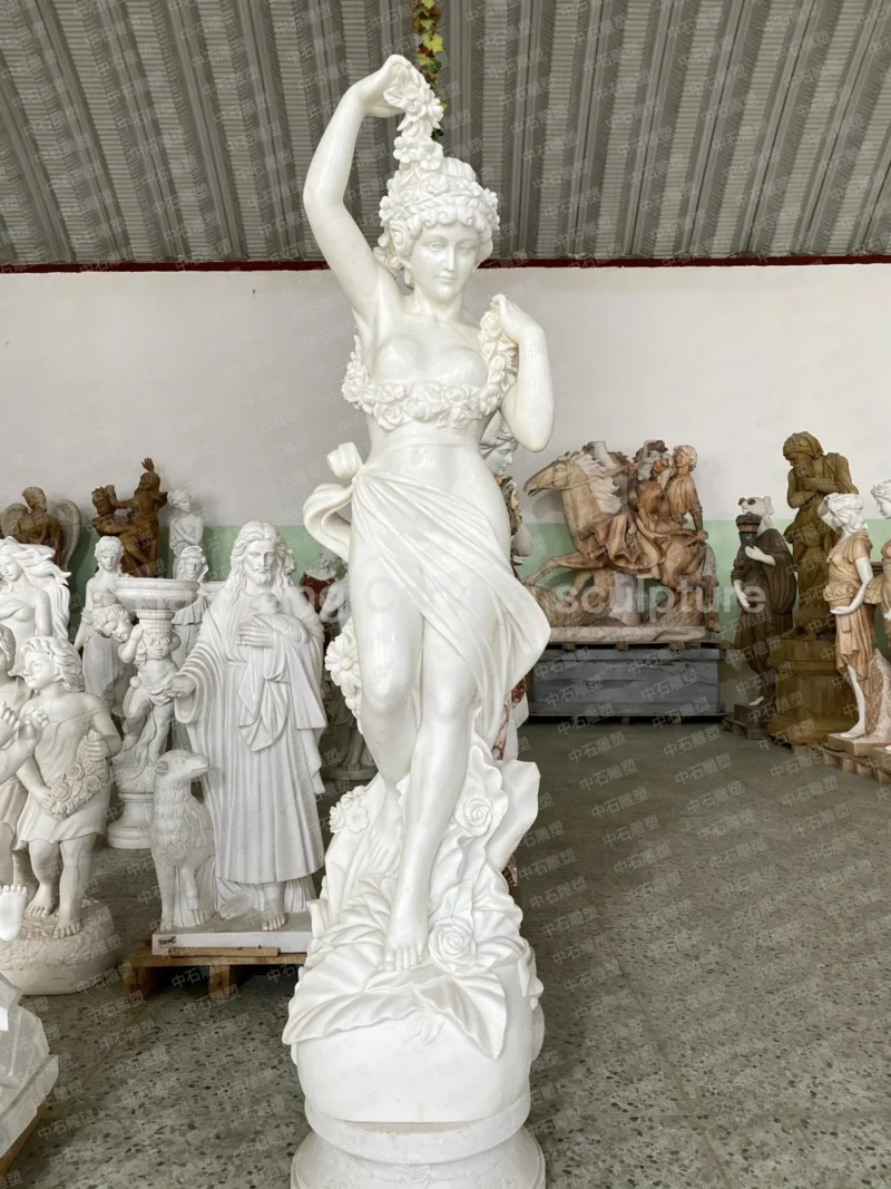 9bdd4bea-f462-48b0-89f0-3043a73fee64.webp White marble European-style Flower Goddess (Flora) themed sculpture