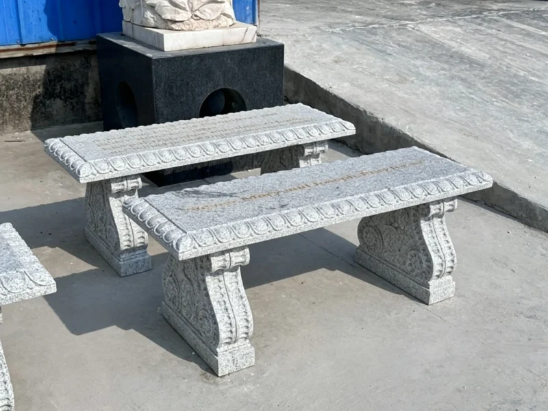 a2f92ca9-0825-4324-97b4-ed25fe6bdca1.webp Granite European style carved stone bench