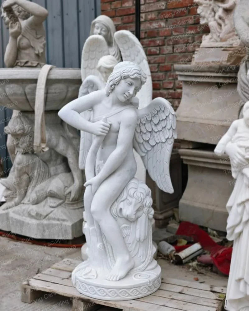 a7bc73c7-44d6-47cf-a37b-545ea7892e6d.webp White marble Cupid (god of love) themed sculpture