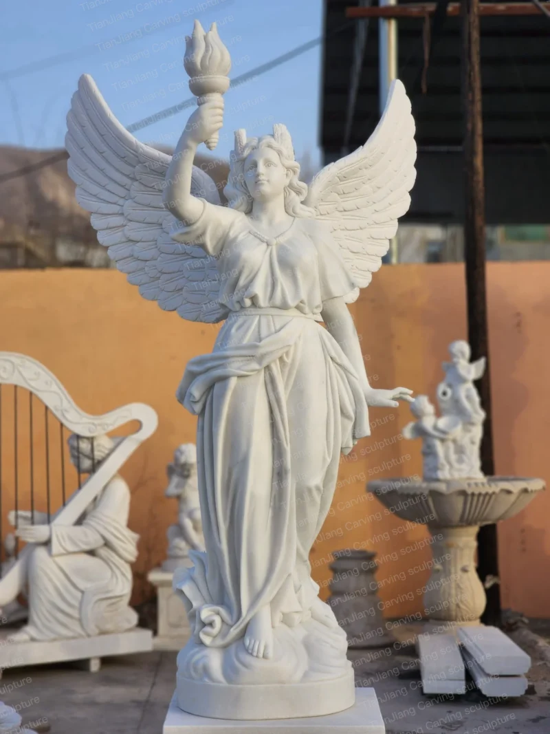 b23027e3-3e31-4097-876e-764d37b6a261.webp White marble goddess of light holding a torch sculpture