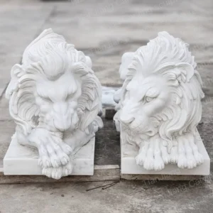 Marble European-style lying lion sculpture (pair)