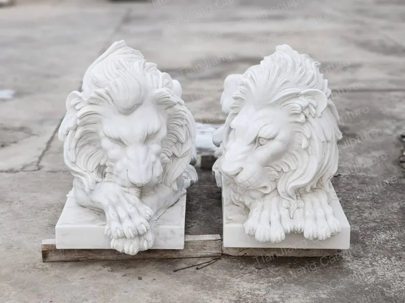 c1a8f6be-3a4b-4831-b275-a978edd25481.webp Marble European-style lying lion sculpture (pair)