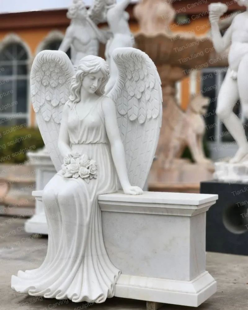 c3110468-7583-40e3-aa34-fca83c5fa3ac.webp White marble seated angel sculpture