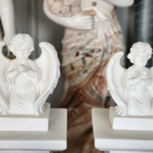 White marble kneeling cherub sculptures (pair)
