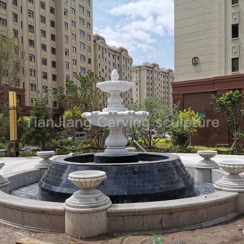 e7fb2e7b-38ac-45f9-b6f0-a90fd7de8809.webp Community landscape large stone fountain