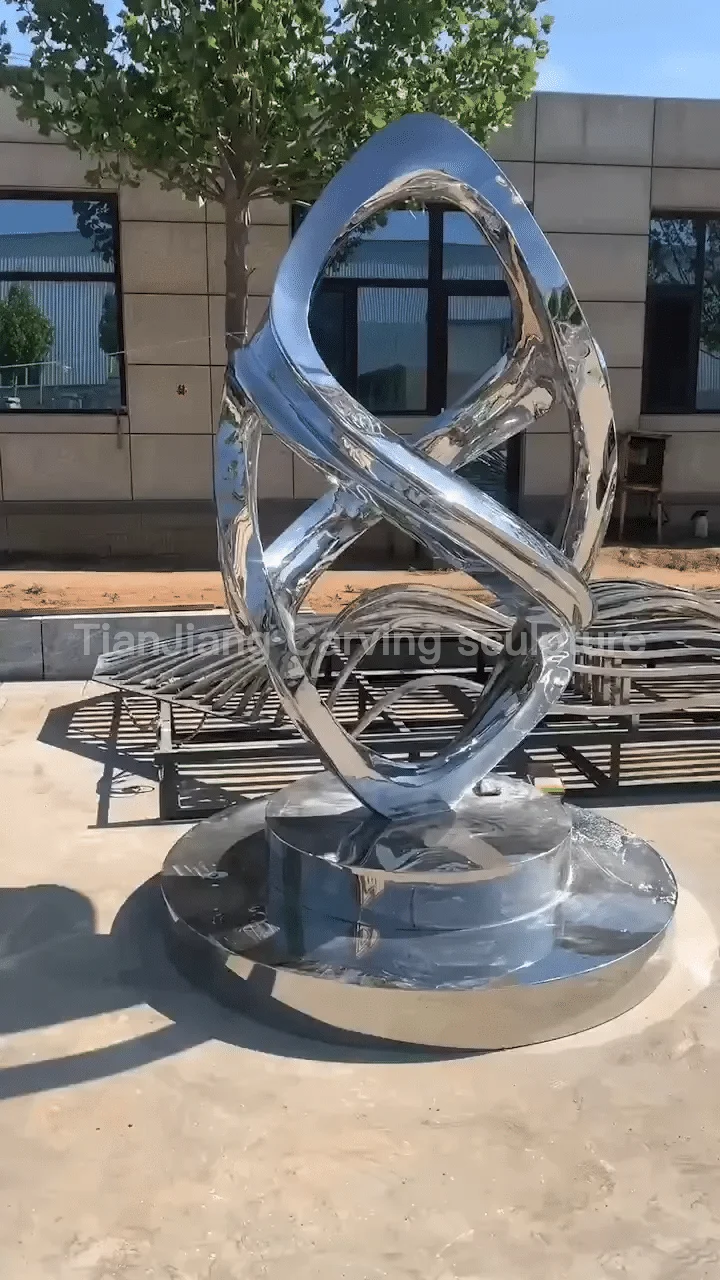 ee37183c-c369-4b3e-a67f-264fcda31ae8.webp Stainless steel mirror intertwined twisting sculpture