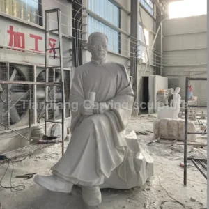 This product is a stone sculpture of a seated statue of Mr. Tao Xingzhi made of white marble.