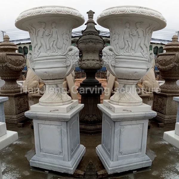 f870bb2b-fda2-4b80-afae-b53b589f5b73.webp White marble European style relief stone flower bowl