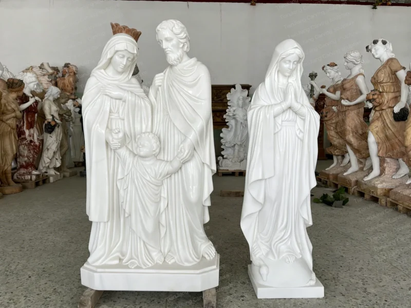 f94b66e5-c4fa-4700-8a65-f9632290b1ad.webp White marble combined sculpture of three members of the Holy Family and the Virgin Mary